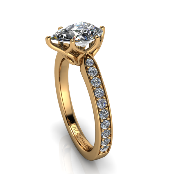 YG Pear shape Dmnd Solitaire with Gold and Dmnd Shank