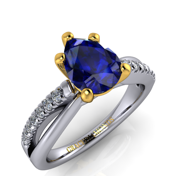 W&Y Gold Pear Cut Blue Sapphire ring & Half Dmnd Split Shank